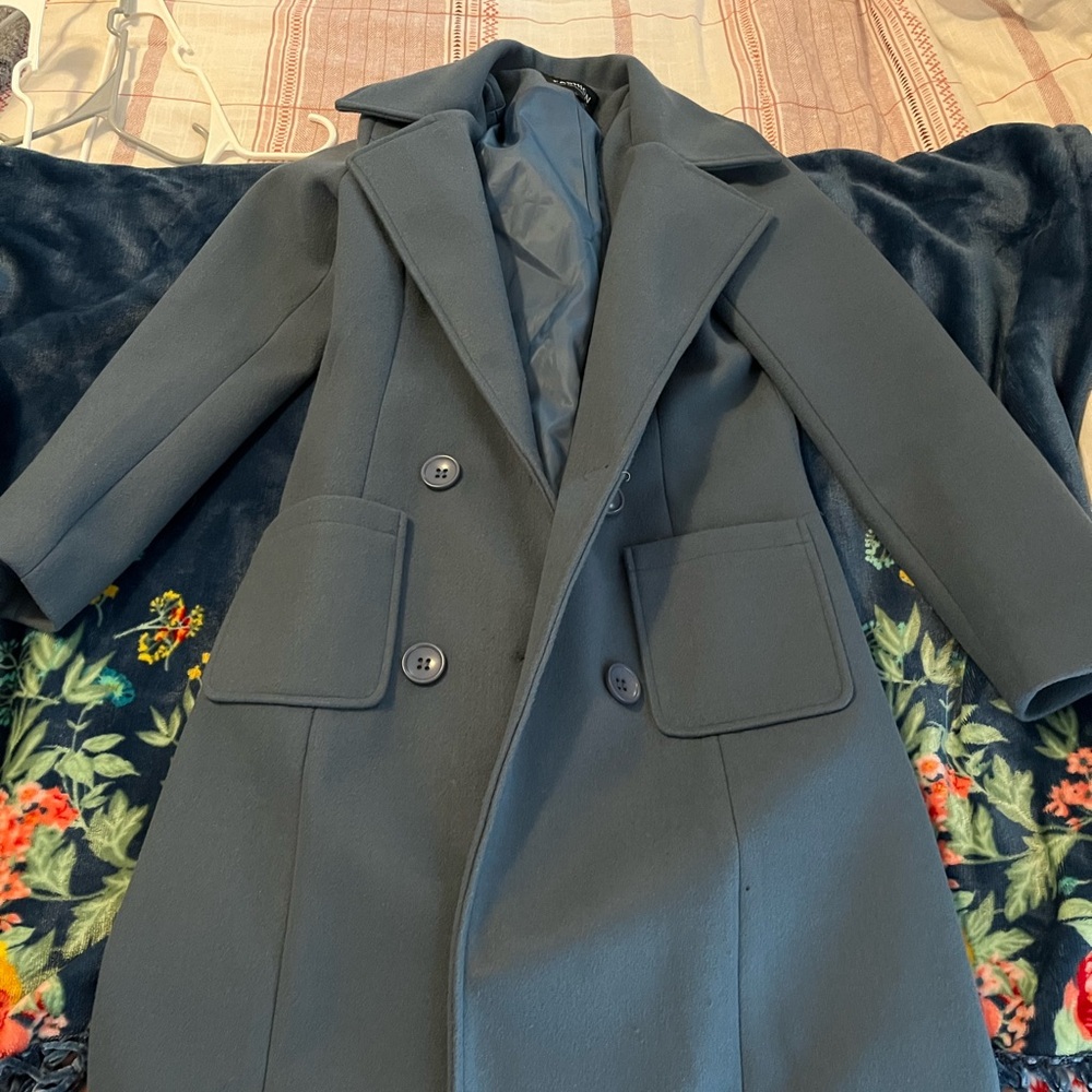 Blue pea coat. Mid length. Wore a few times